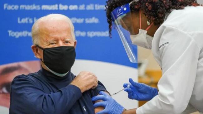 BIDEN-TAKES-PFIZER-VACCINE-FIRST-DOSE